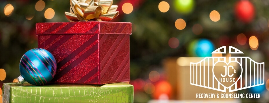 holiday-gifts-stacks-of-christmas-presents-under-christmas-tree-jcblog2