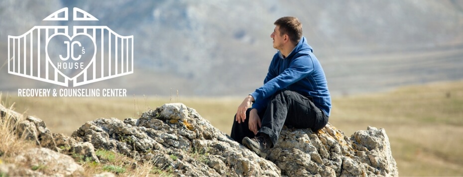 rock-bottom-rise-up-man-relaxing-on-top-of-mountain-jcblog1